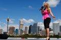 Anja Nissen sings the Australian national anthem on board HMAS Canberra at the launch of the 2015 Australia Day program.