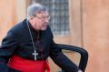 Cardinal George Pell arrives for a morning session of a synod on family issues at the Vatican in October, 2014.