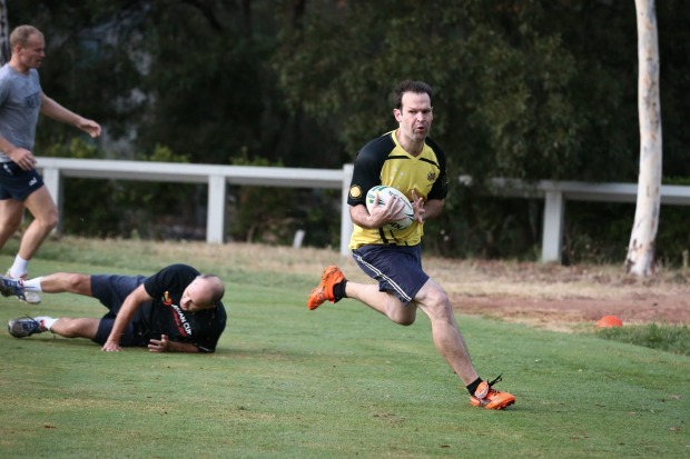 Canavan scores a try during the Pollies v Press Gallery touch footy match at Parliament House in Canberra in March 2016.