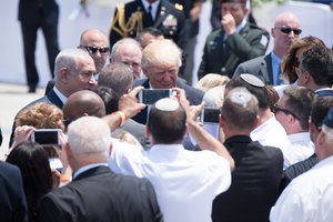 President Donald Trump and First Lady Melania Trump are welcomed by Prime Minister of Israel Benjamin Netanyahu, and Israeli President Reuven Rivlin, on their arrival to Ben Gurion International Airport, Monday, May 22, 2017, in Tel Aviv, Israel.