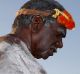 Gumatj clan ceremonial leaders present a woomera to Mutitjulu elder Reggie Uluru after performing the Gurtha ceremony at ...