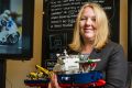 National manager of cyber security at DHS Narelle Devine with a Lego model to be used in cyber war games this year.