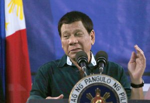 Philippine President Rodrigo Duterte addresses troops during his visit to the 2nd Mechanized Brigade Friday, May 26, 2017 on the outskirts of Iligan city in southern Philippines.