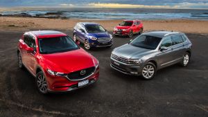 Mid-size SUV comparison: The new Mazda CX-5, Ford Escape and Nissan X-Trail take on the on the Volkswagen Tiguan.