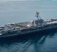 China has labelled the US Navy's decision to sail "without permission" close to an artificial island Beijing claims in ...