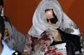 Schapelle Corby leaves the parole offices in Denpasar after signing papers before being deported today from Ngurah Rai ...