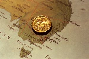 Economists expect Australia's currency to break out the bottom of its tight trading band, after the yield differential ...