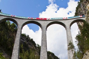 Glacier Express crossing the Landwasser Viaduct near Filisur, Graubuenden.