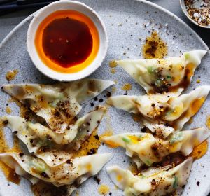 Kylie Kwong's scallop and ginger dumplings with Sichuan chilli dressing and Sichuan pepper and salt.