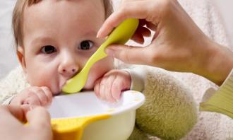 Baby eating from spoon