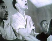 Roger Johnson and Pete Seeger singing "We shall overcome"