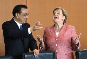 German Chancellor Angela Merkel and China's Premier Li Keqiang joke prior to a meeting at the chancellery in Berlin, Germany, Wednesday, May 31, 2017.