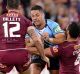 BRISBANE, AUSTRALIA - MAY 31: Jarryd Hayne of the Blues takes on the defence during game one of the State Of Origin ...