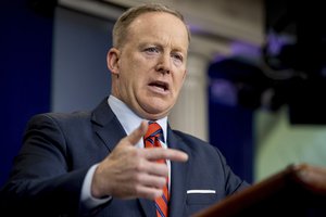 White House press secretary Sean Spicer talks to the media during the daily press briefing at the White House in Washington, Tuesday, April 11, 2017.