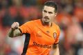 Jamie Maclaren of the Roar celebrates after scoring in the penalty shootout against the Wanderers in April.