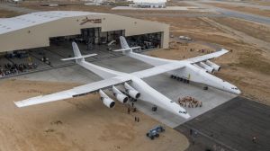 28 wheels, six 747 jet engines: World's largest plane rolls out of the hanger.
