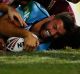 Teddy time: James Tedesco of the Blues scores against Queensland at Suncorp Stadium on Wednesday night.