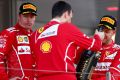 Not happy: Ferrari driver Kimi Raikkonnen (left) made clear in post-race interviews that he was not pleased with team ...