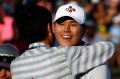 South Korea's Si Woo Kim celebrates on the 18th green after winning The Players Championship.