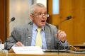 One Nation senator Malcolm Roberts puts questions to chief scientist Alan Finkel during a Senate estimates hearing.