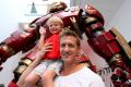 Nicolas Pougnet and son Lucas, 4, visit the Marvel exhibition at GOMA.