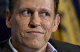 Peter Thiel pauses while listening to a question during a news conference at the National Press Club in Washington, DC.