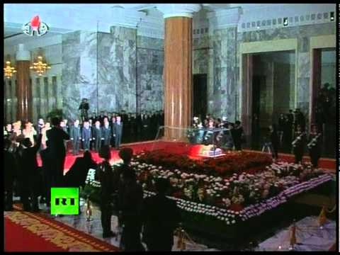 Kim Jong-Il in glass coffin: First video of farewell ceremony in North Korea