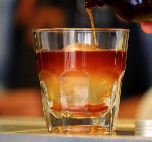 Cold brew coffee is often served over a 'spherical ice cube that melts slower than the devil's heart'.