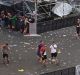 Visitors leave the music festival Rock am Ring outside the western town of Nuerburg, Germany, Friday, June 2, 2017. ...