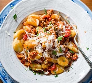 Bolognese gnocchi with parmesan cheese