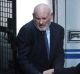 Ian Macdonald is led into the Supreme Court on Friday to be sentenced. 