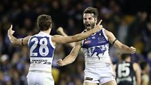 MELBOURNE, AUSTRALIA - MAY 28:  Luke McDonald of the Kangaroos celebrates after kicking a goal during the round 10 AFL ...