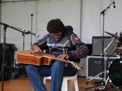 Guitar virtuoso Chris Tamwoy performs.