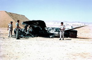 File - Israeli troops examine a destroyed Egyptian aircraft following the Six Day War, June 1967.