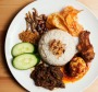 Nasi lemak 'komplit' is a complete lunch.