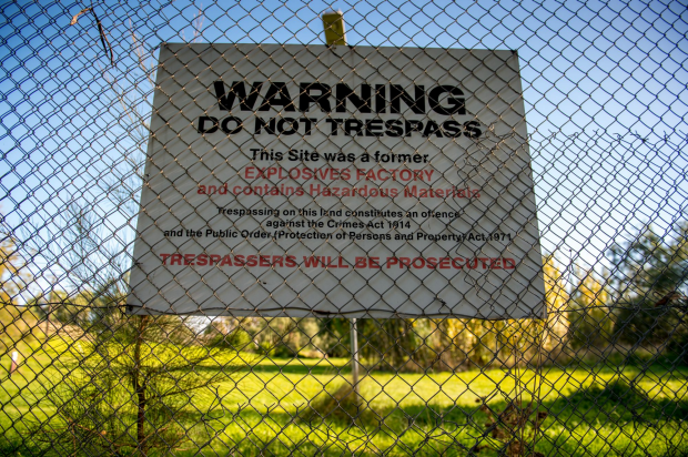 A sign at the entrance to the contaminated site. 