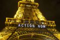 The Eiffel Tower lit up during the UN climate conference in Paris in 2015.