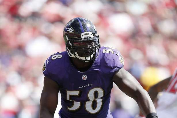 TAMPA, FL - OCTOBER 12: Elvis Dumervil #58 of the Baltimore Ravens in action against the Tampa Bay Buccaneers during the game at Raymond James Stadium on October 12, 2014 in Tampa, Florida. The Ravens defeated the Buccaneers 48-17. (Photo by Joe Robbins/Getty Images)