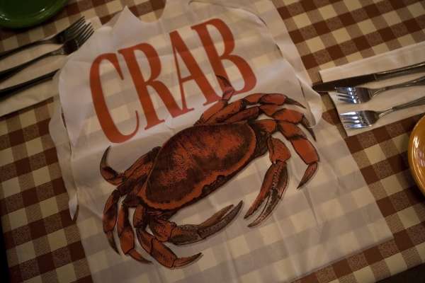 A crab bib is displayed at the Cippino's restaurant on Sunday, Mar. 2, 2014 in San Francisco, Calif. Cioppino's is a  a popular restaurant at the wharf and manages to keep a fairly old-school menu of San Francisco specialties