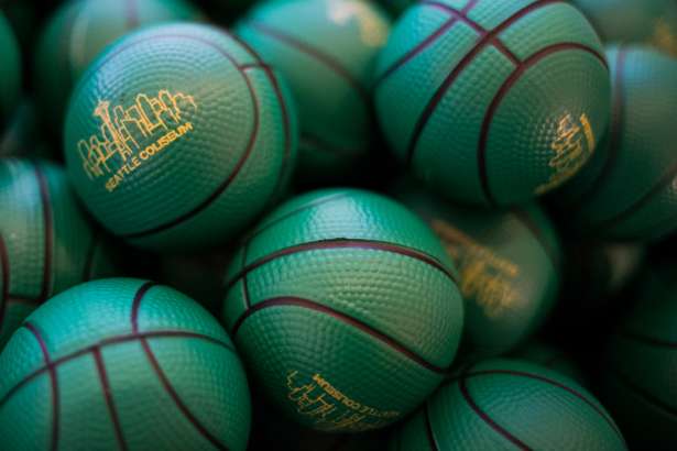 Seattle Partners Seattle Coliseum branded basketball in Sonics' colors, fill a bowl during the KeyArena RFP open house at KEXP on Thursday, May 11, 2017.