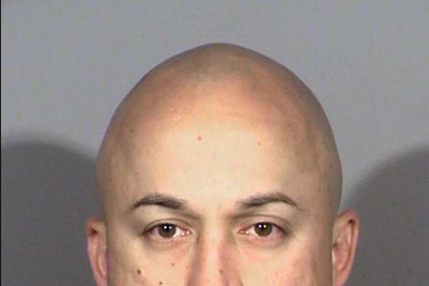 This undated photo provided by Clark County Detention Center shows Las Vegas police officer Kenneth Lopera. Sheriff Joe Lombardo said Lopera was suspended without pay and arrested Monday, June 5, 2017, on felony involuntary manslaughter and oppression under color of office charges in the May 14, 2017, in-custody death of Tashii S. Brown, 40, of Las Vegas. Brown also used the name Tashii Farmer. (Clark County Detention Center via AP)