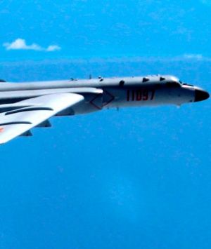 A Chinese H-6K bomber patrols the islands and reefs in the South China Sea.