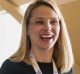 Marissa Mayer, president and chief executive officer at Yahoo! Inc., exits after a press conference at the Yahoo! Inc. ...