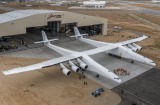 Paul Allen's Stratolaunch plane emerges from its hangar in Mojave, California, on May 31.