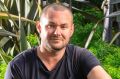 A. Baker head chef Bernd Brademann in the restaurant's garden in New Acton.