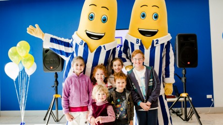 The Royal Australian Mint is celebrating 25 years of Bananas in Pyjamas. Back: Chelsea McInerney, 8, Elodie McInerney, ...