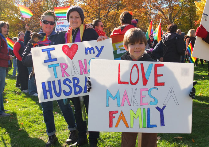 A community comes together and holds an impromptu rally after two LGBTQ+ flags were burned in their neighborhood in an apparent hate crime.