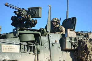 A U.S. Soldier with the 2nd Squadron, 2nd Cavalry Regiment, searches his sector of fire for simulated enemy forces while providing security during exercise Allied Spirit IV at the U.S. Army’s Joint Multinational Readiness Center in Hohenfels Training Area, Germany, Jan. 29, 2016.