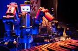 'Baxter', a product of Adelaide-born Rodney Brooks' Rethink Robotics, plays the xylophone with a human orchestra at ...