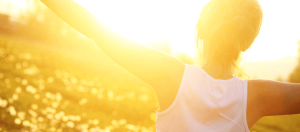 Woman embracing sunshine